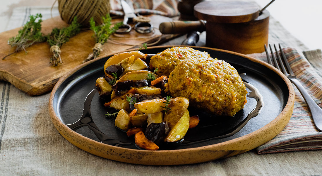 Oven-baked chicken oat burger with artichokes, baby potatoes, carrots &amp; olives Aggelakis